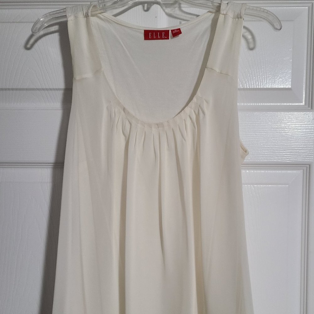 Cream sleeveless flowy dressy blouse